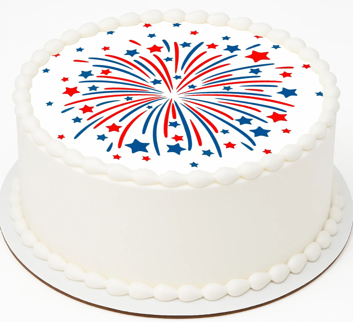 White cake with red, blue, and white star and stripe design on a white background