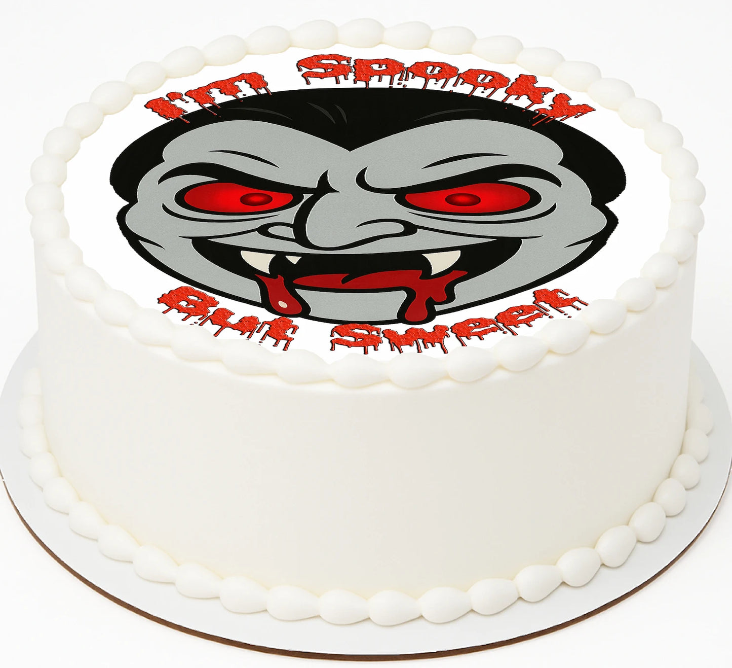 Edible Image for cake with a Vampire face and text sayig 'I'm spooky but Sweet'
