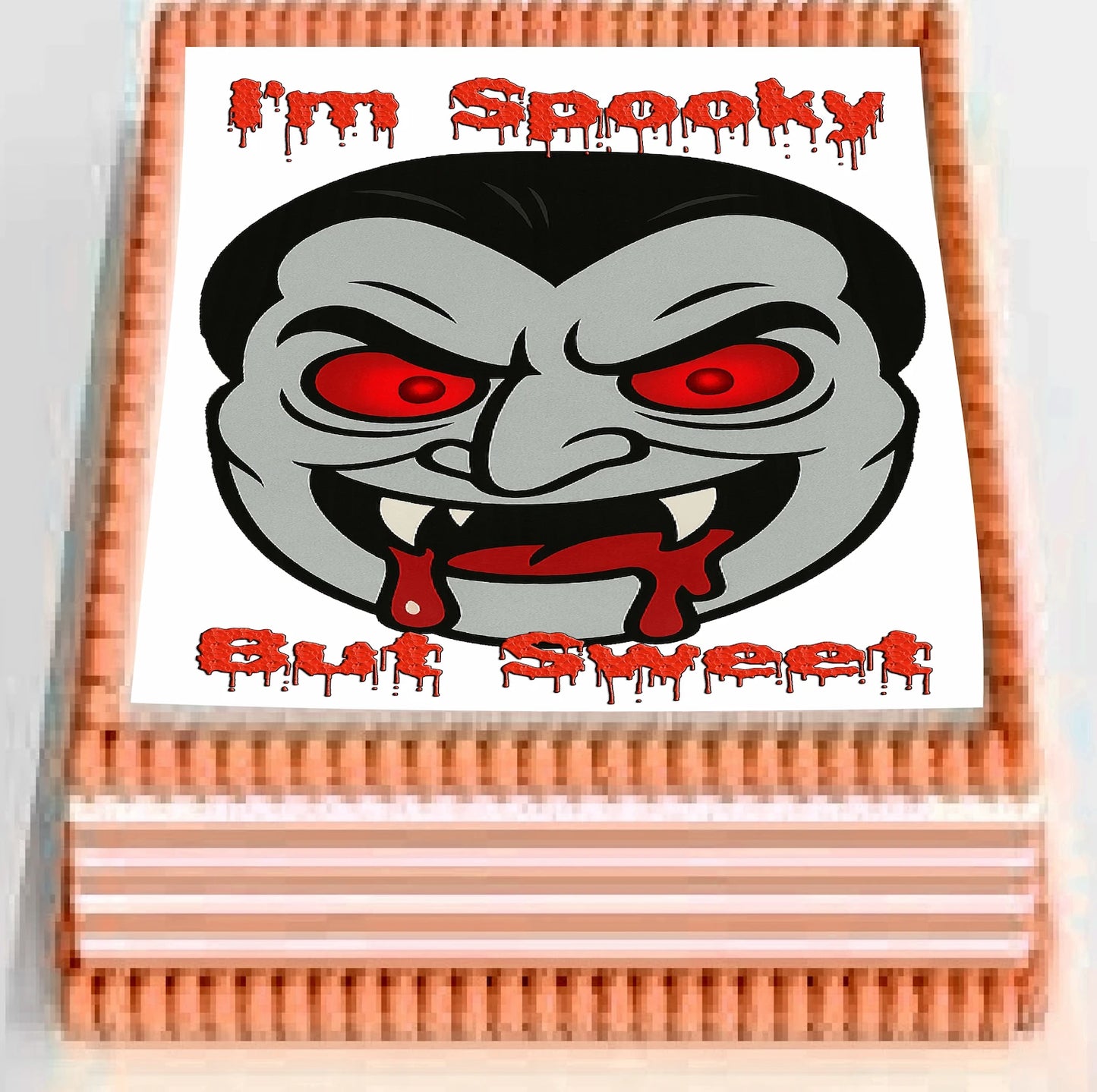 Halloween-themed Icing Images with a vampire face design and text 'I'm Spooky But Sweet'
