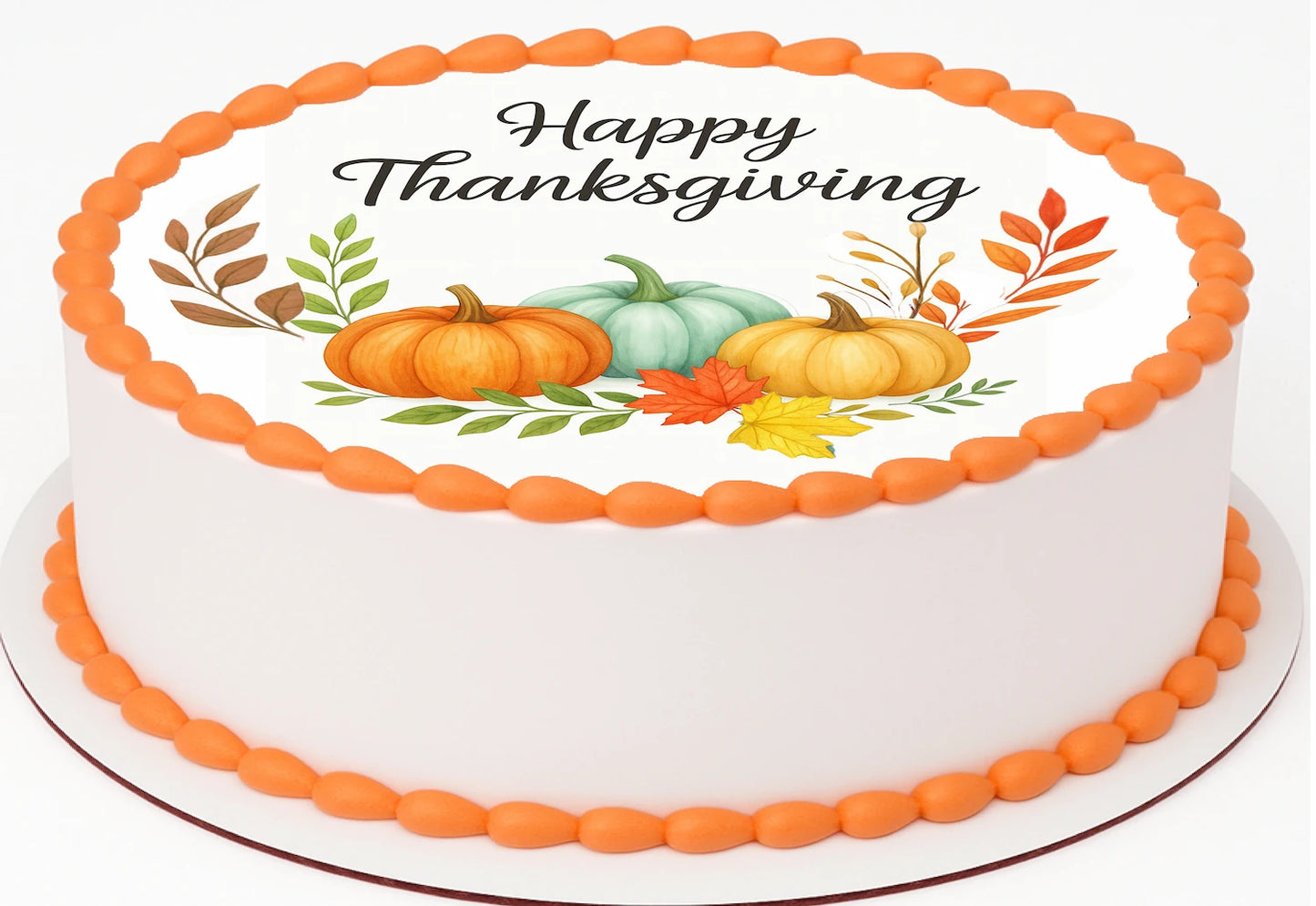 Thanksgiving-themed cake topper with pumpkins and leaves on a precut edible image