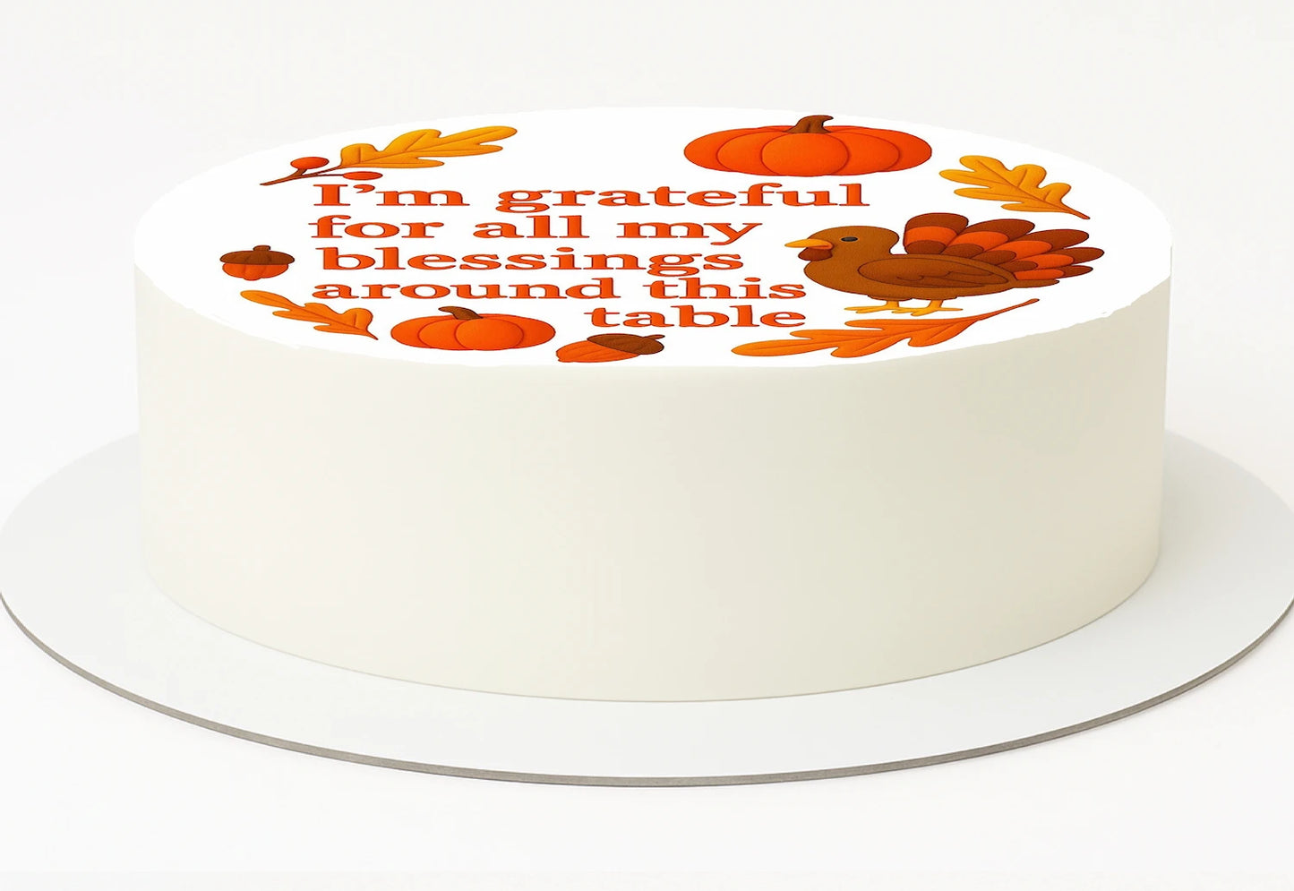 Thanksgiving-themed cake topper with all my blessings around this table text on a precut edible image