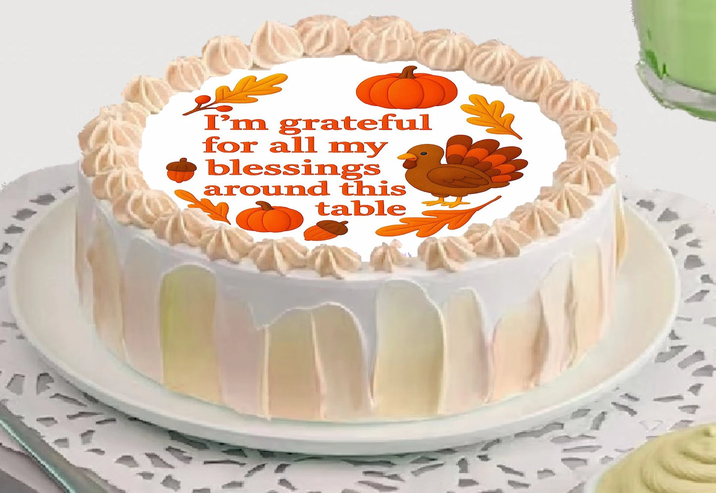 Thanksgiving-themed cake topper with pilgrim and pumpkins design a edible image