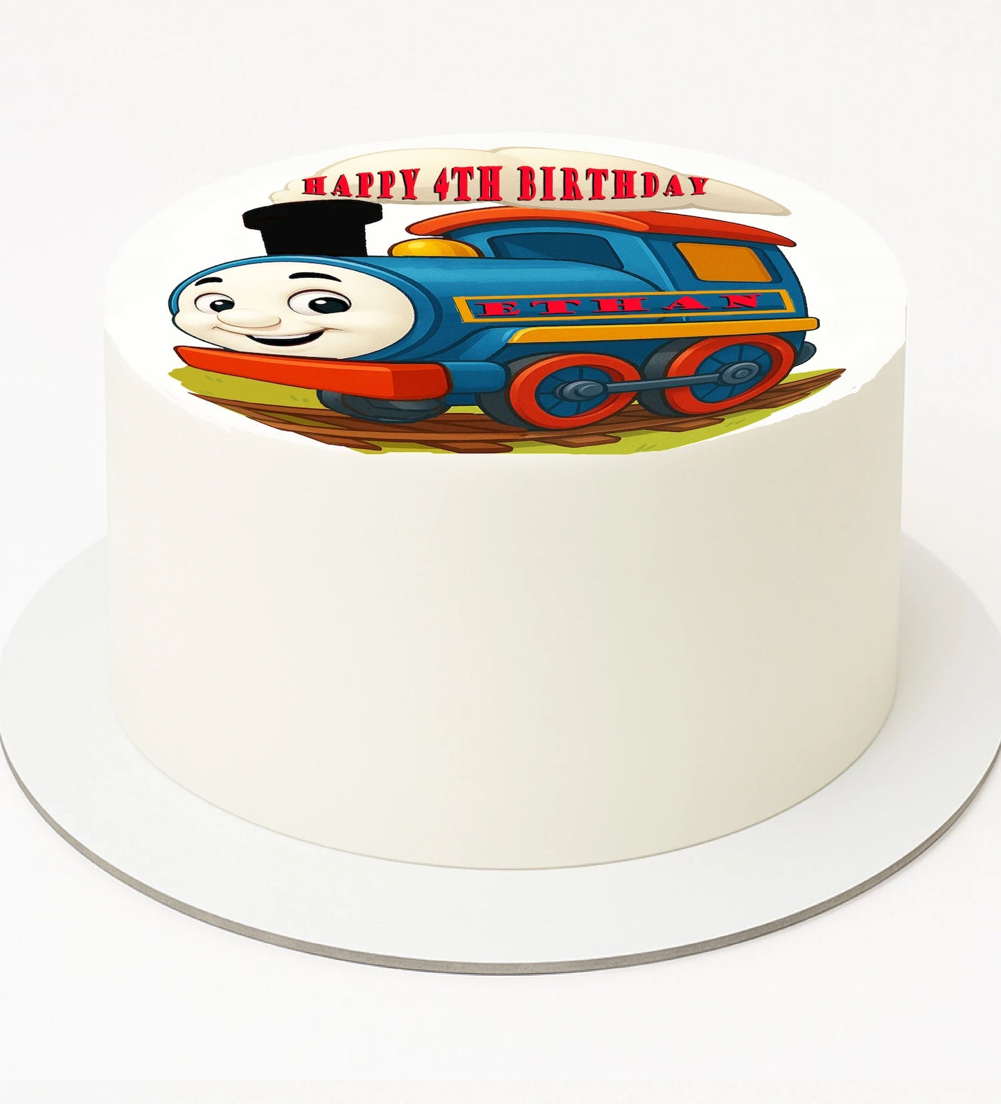 Birthday cake with a train design made of edible icing and 'Happy Birthday' text