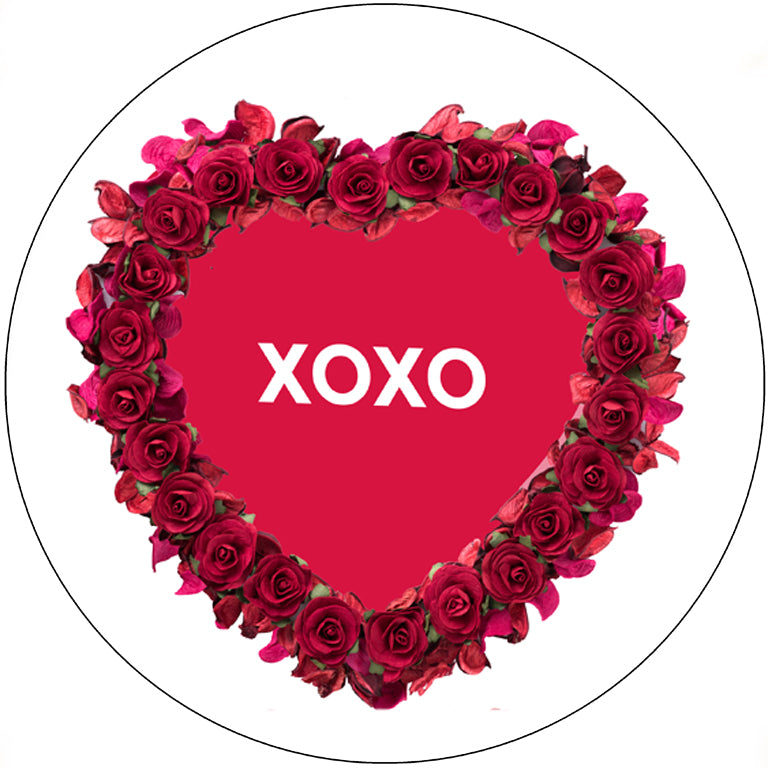 Heart-shaped arrangement of red roses with 'XOXO' text on a white background