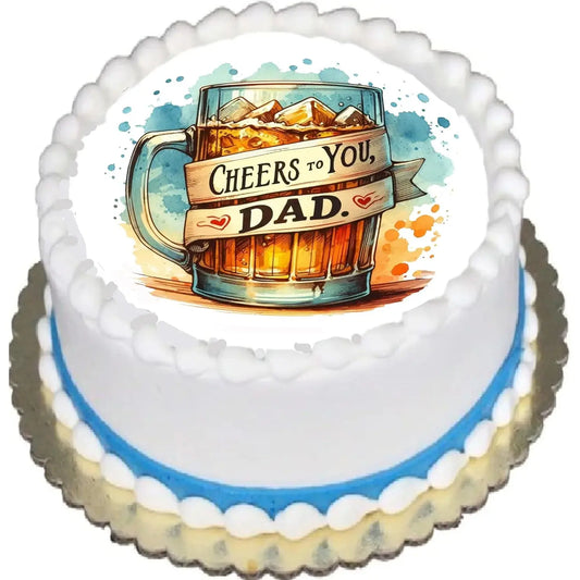 Father's Day edible icing cake topper with a mug with Cheers to You Dad lettering, shown on a frosted cake.