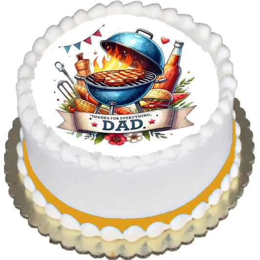 Father's Day edible icing cake topper with a barbecue grill, shown on a frosted cake.