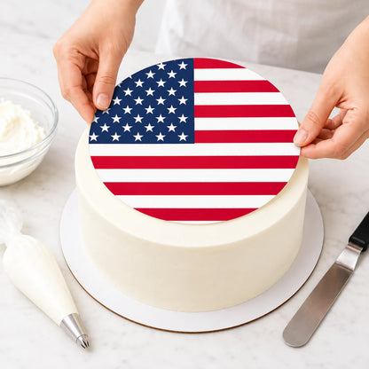 American Flag Custom Edible Icing Cake Topper – 8-Inch Round being placed on a frosted cake.