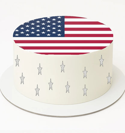 Cake with red, white, and blue starburst design on a white background