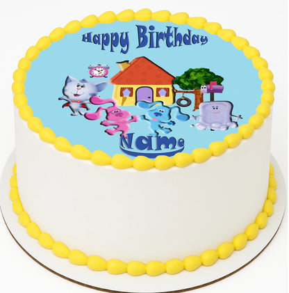 Edible image cake topper with  cartoon blue clue characters and 'Happy Birthday'.