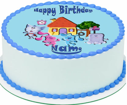Edible image cake topper with cartoon blues clues characters and 'Happy Birthday' text.