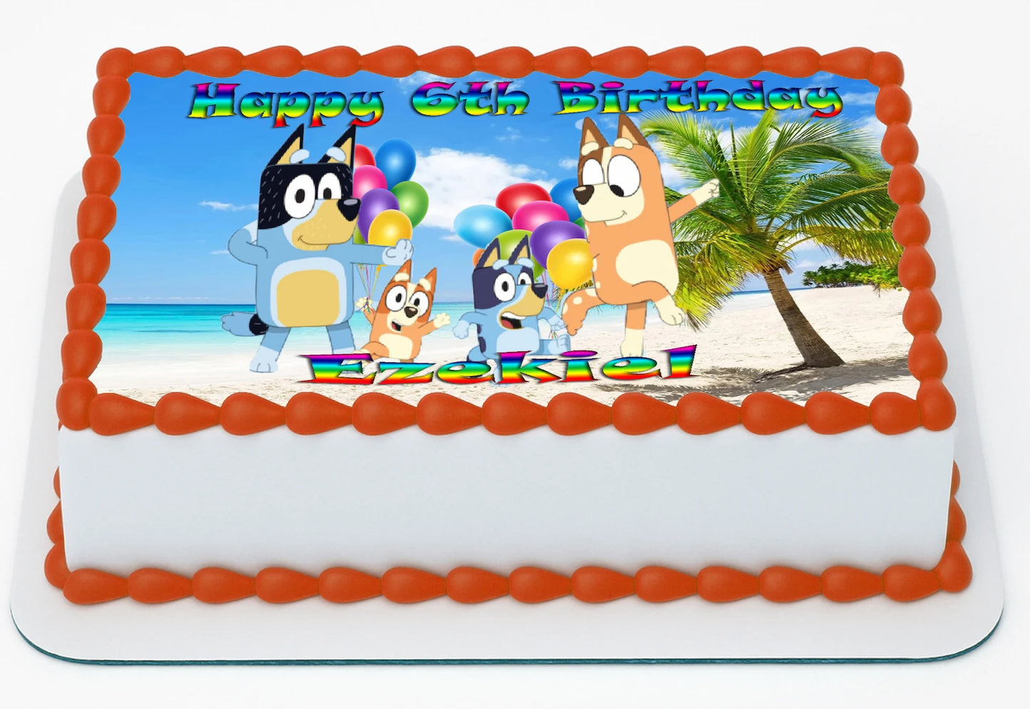 Bluey Dog  Edible Icing Images Cake Topper with a Personalized 'Happy Nth Birthday'  and Name featuring dog cartoon characters on a beach scene.