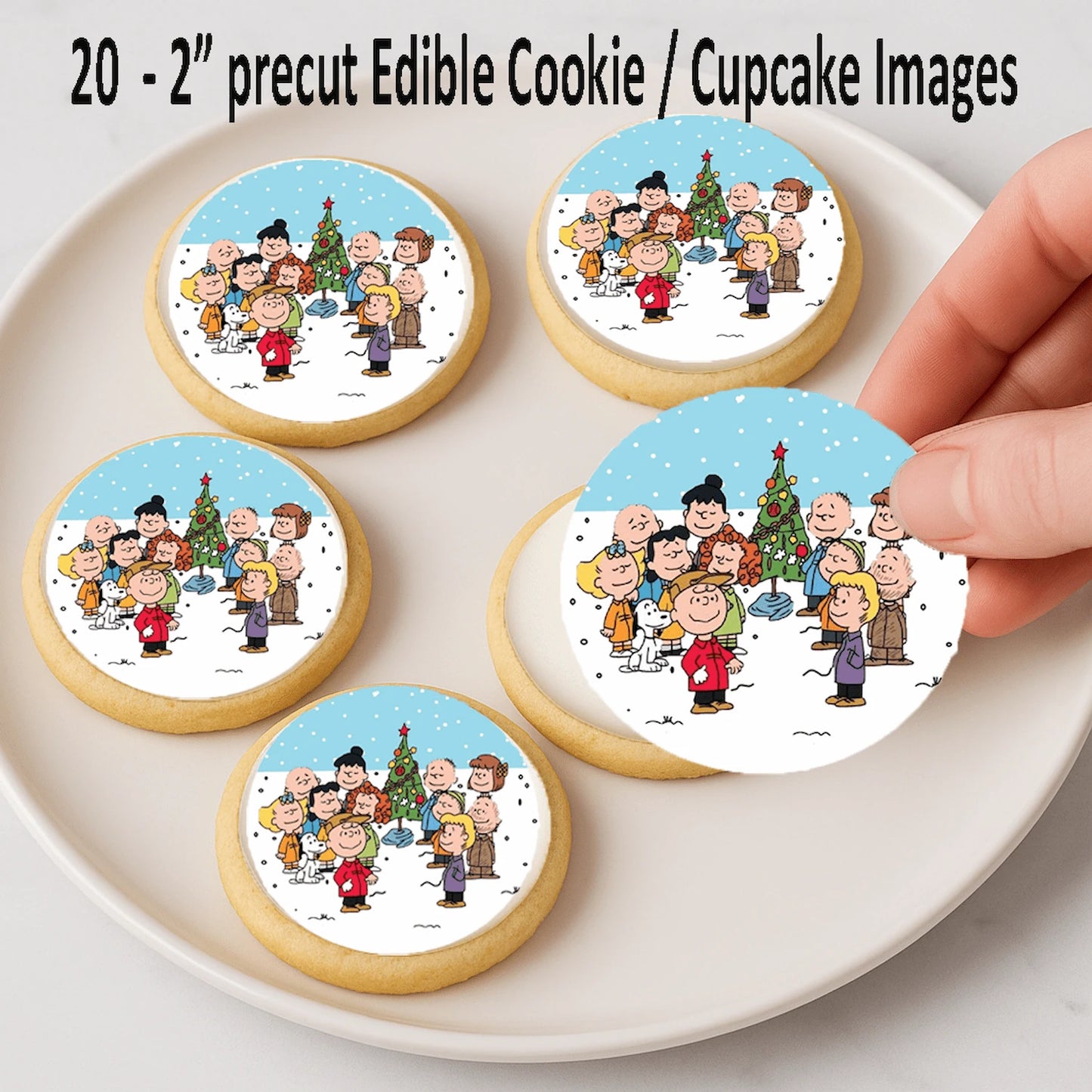 Christmas Charlie Brown edible cake images being placed on cookies – holiday dessert icing images for Christmas fun.
