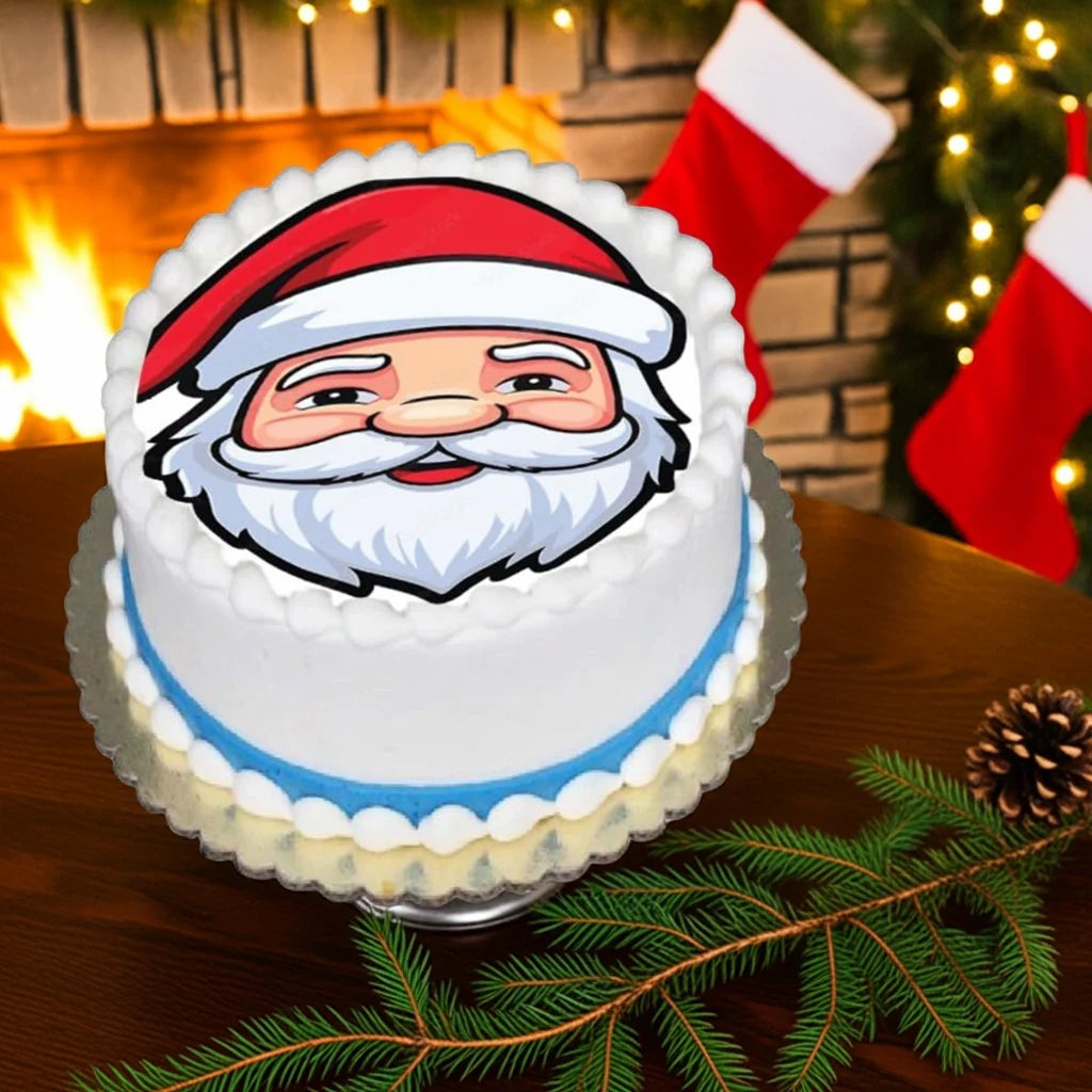 Beautiful Collection of Holiday Sprited Edible Image Cake Toppers on a table in front of a fireplace with christmas stockings the image is of Santa Clauses face.