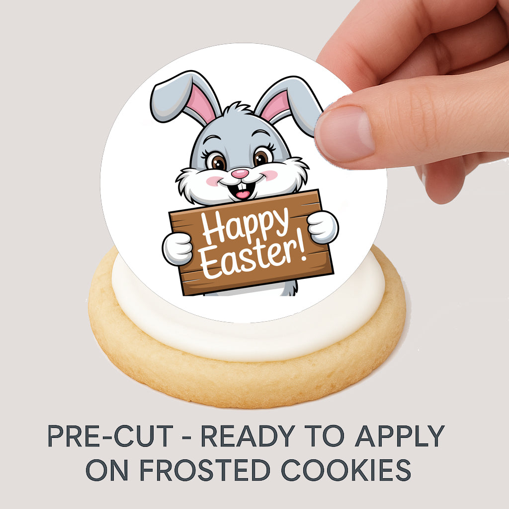 Easter bunny sticker with 'Happy Easter!' text on a cookie, held by a hand.