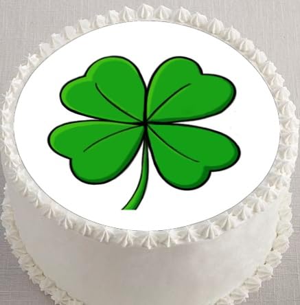 Round precut cake topper with a green four-leaf clover decoration on edible image.