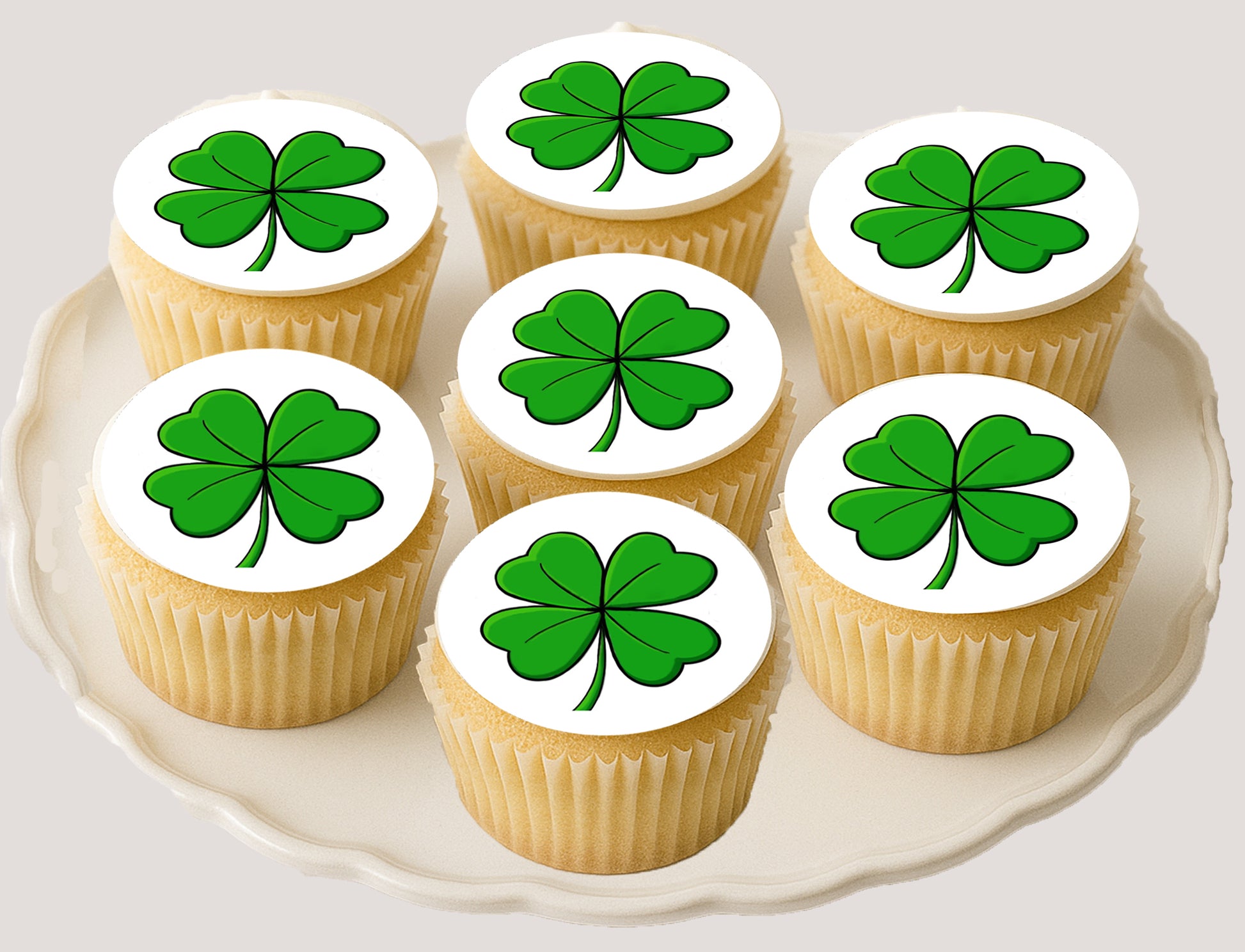 Get your Irish on With 4 Leaf Clover St. Paddy Day Edible Image Cookie & Cupcake Toppers on a plate of cupcakes
