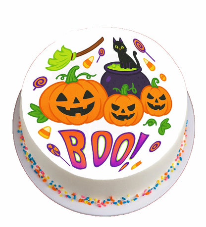 Halloween-themed cake topper with pumpkins, cauldron, and 'BOO!' text 