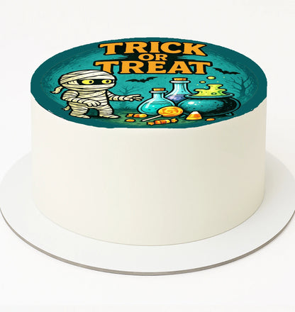 Halloween-themed cake topper with mummy