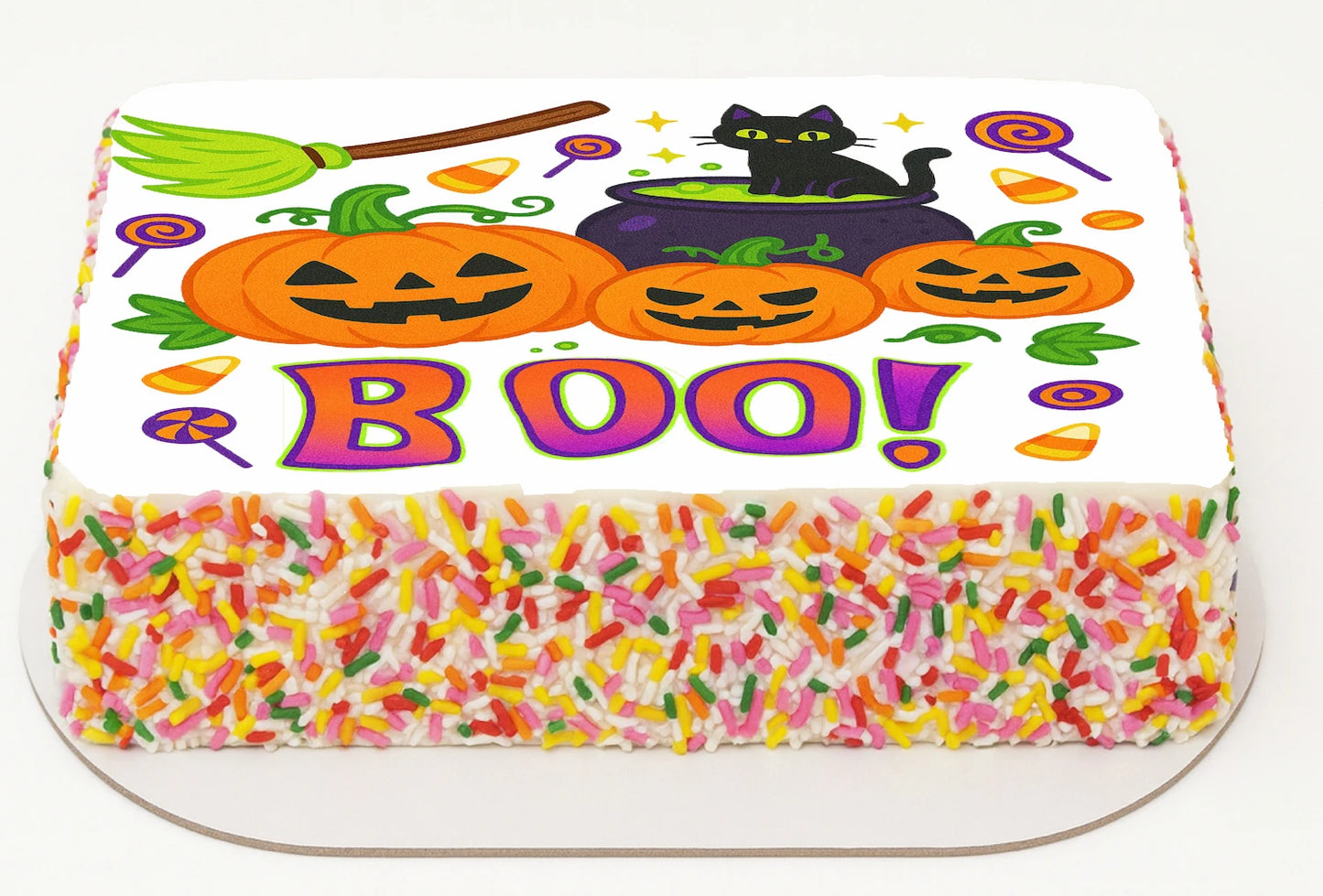 Halloween-themed Icing Image topper with pumpkins, a black cat, and colorful sprinkles on a white background