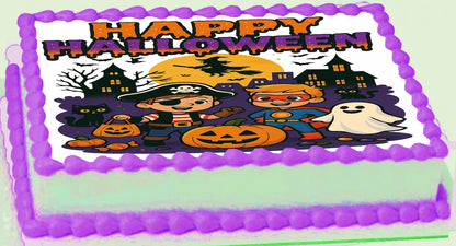 Halloween-themed toppere with decorative icing and 'Happy Halloween' text.