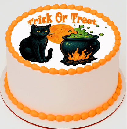 Halloween-themed cake with black cat, cauldron, and 'Trick or Treat' text 