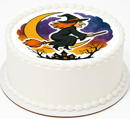 Halloween-themed edible image for cake with a witch riding a broom over a crescent moon design