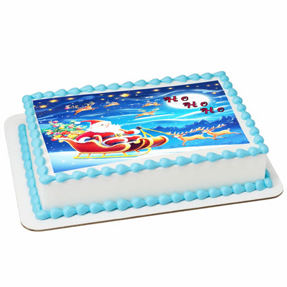 Rectangular cake with Santa Claus and reindeer design on a white background