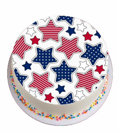 Cake with red, white, and blue star decorations on a white background