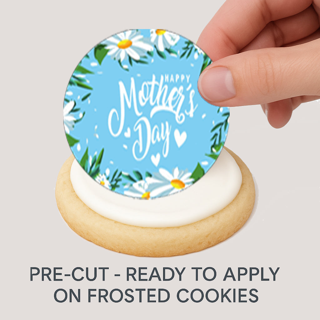 Hand appling a Mother's Day Daisies Edible Image Cookie Topper