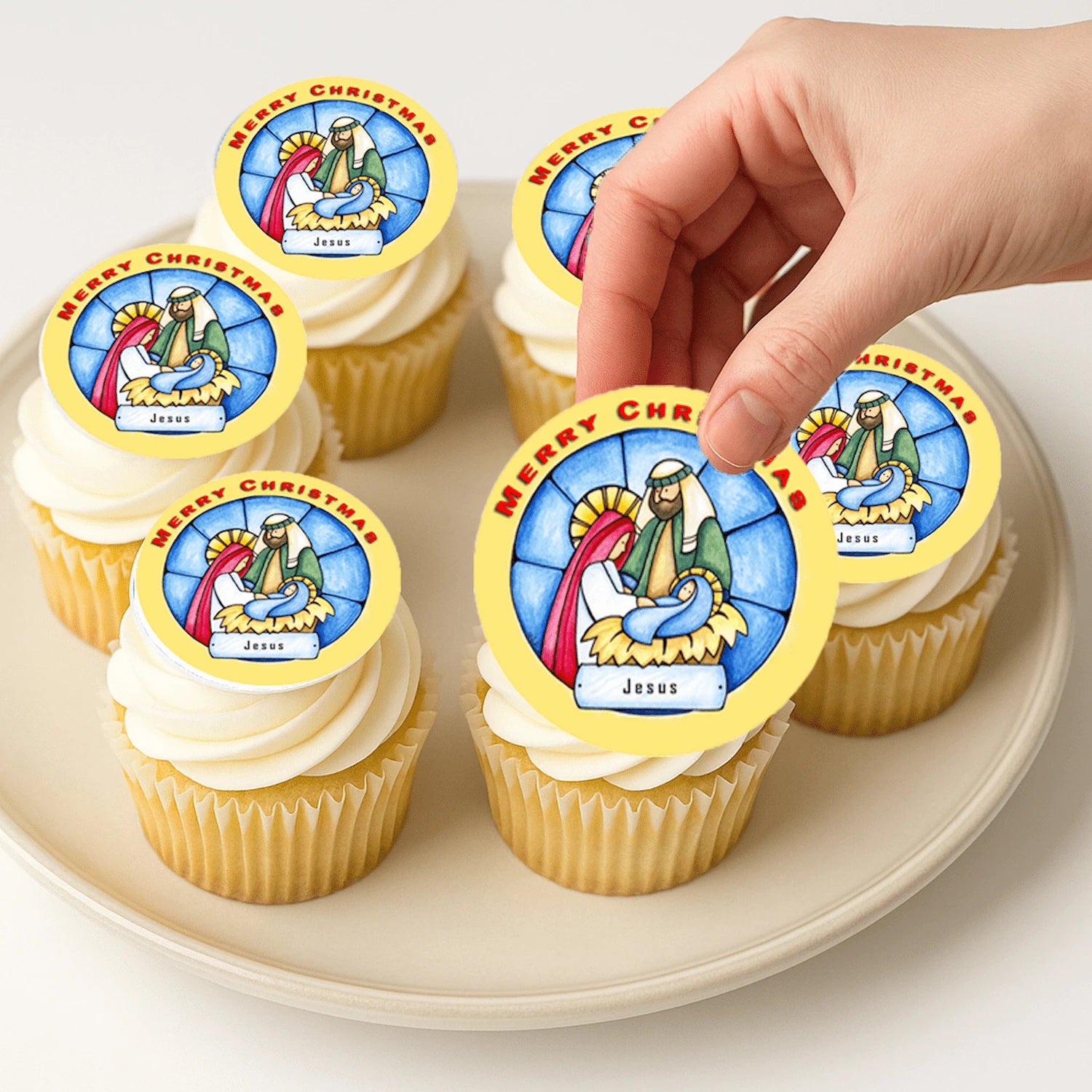 Applying Christmas Nativity edible cake images on frosted cupcake – Christmas Nativity edible cake images are perfect holiday treats