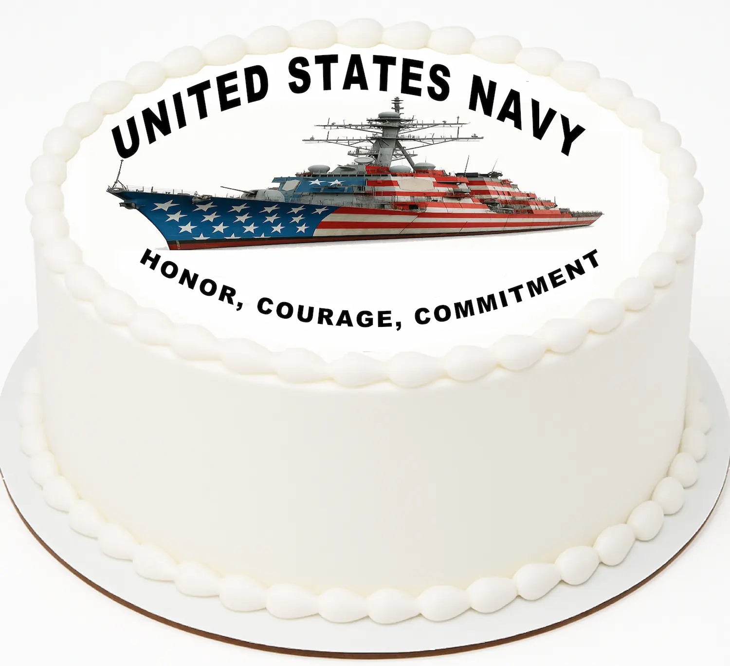 White cake with a United States Navy ship design and text on a white background
