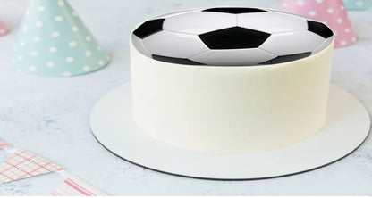 Edible image cake topper with a black and white soccer ball design.