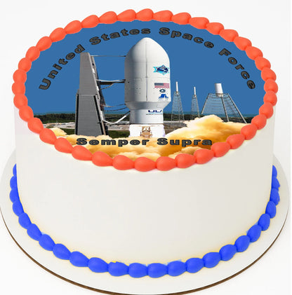 Cake with space-themed decoration featuring a rocket and 'United States Space Force Semper Supra' text.