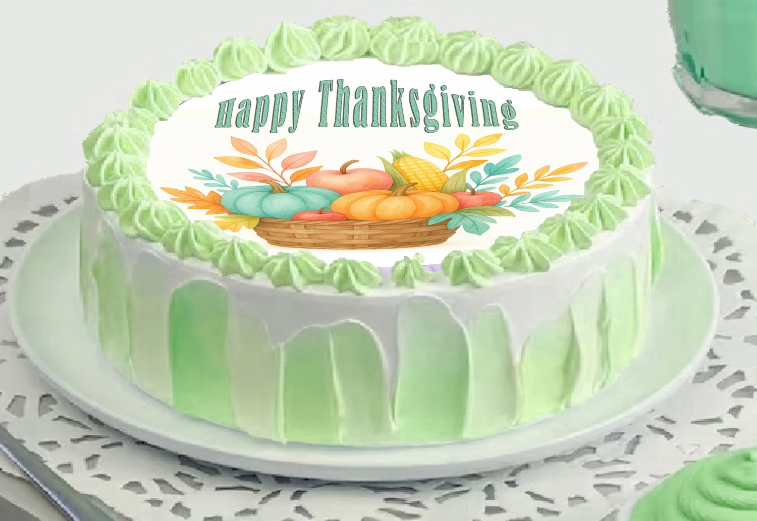 Thanksgiving-themed cake topper with a basket of fruits and 'Happy Thanksgiving' text on a precut edible image.