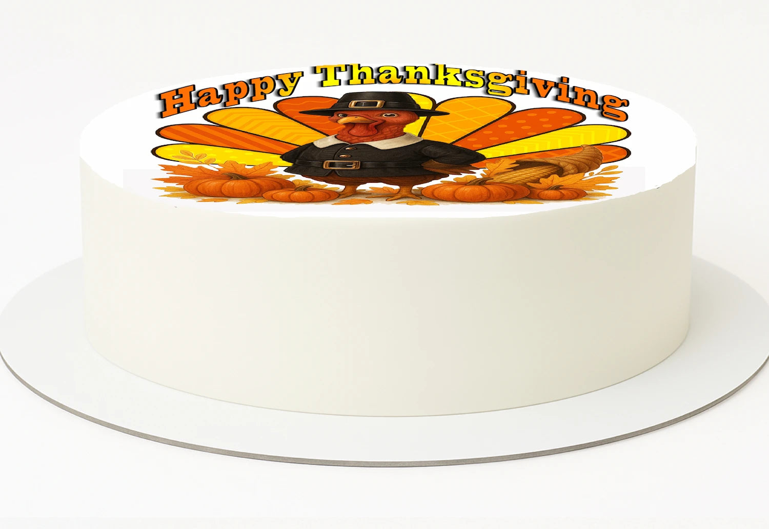 White cake with a 'Happy Thanksgiving' decoration featuring a pilgrim and pumpkins on a white background.