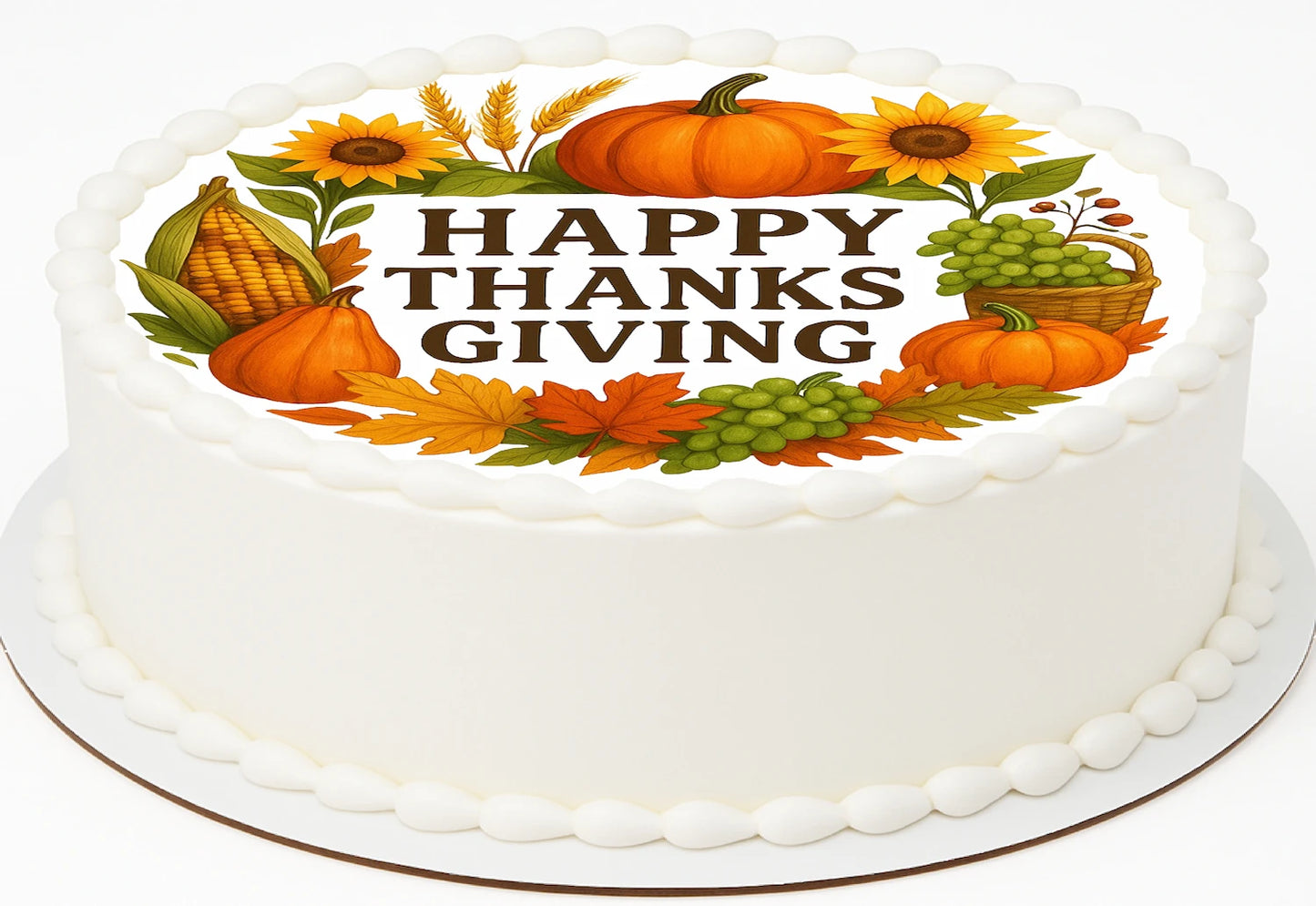 Thanksgiving-themed cake featuring a wreath cake with edible image cake topper with pumpkins, sunflowers, and corn.