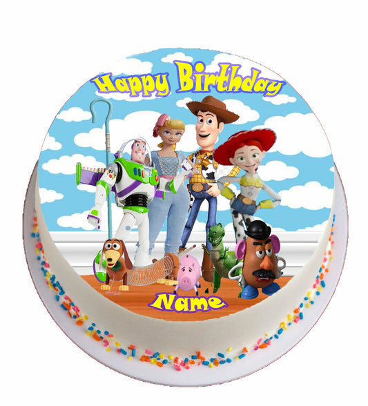 cake topper on a  cake with toy story charactors and 'Happy Birthday Ethan' text.