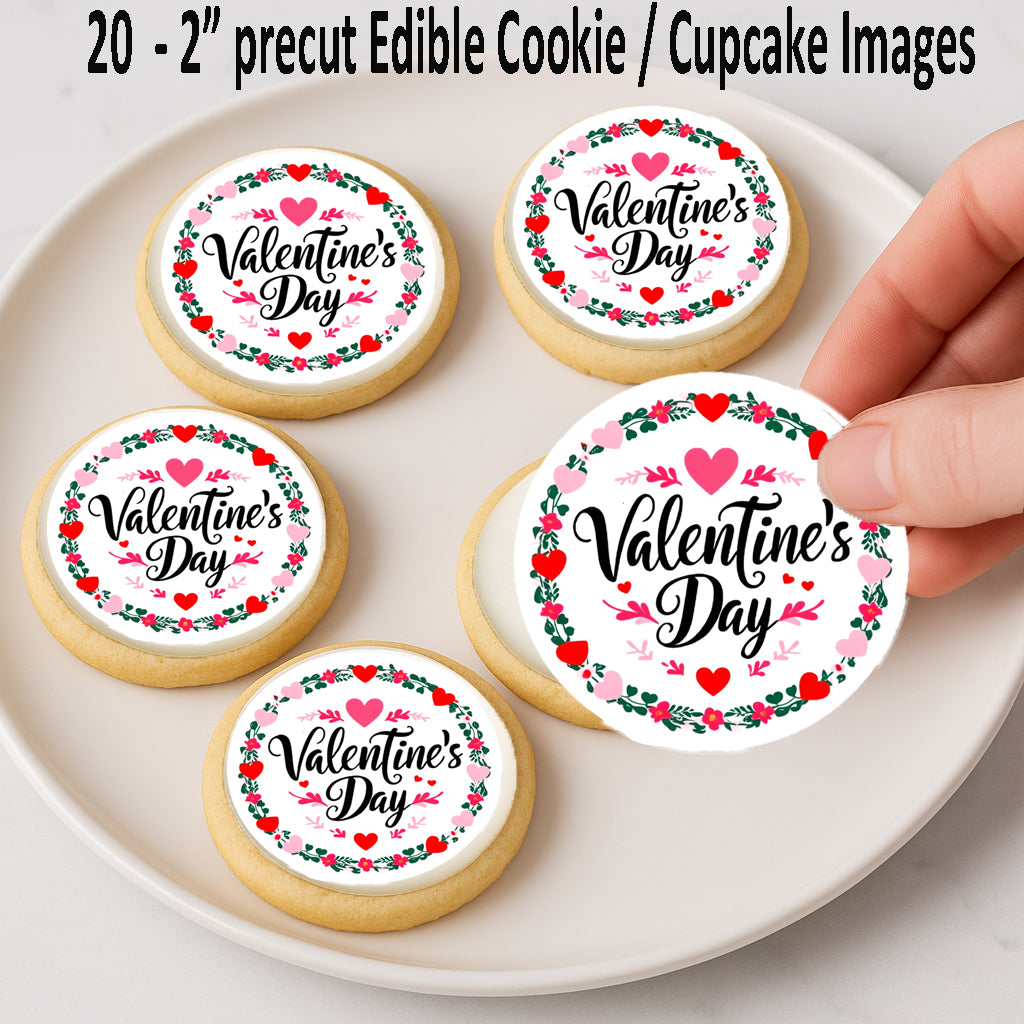 Edible Valentine's Day cookies on a plate with a hand applyng an edible image cookie topper.