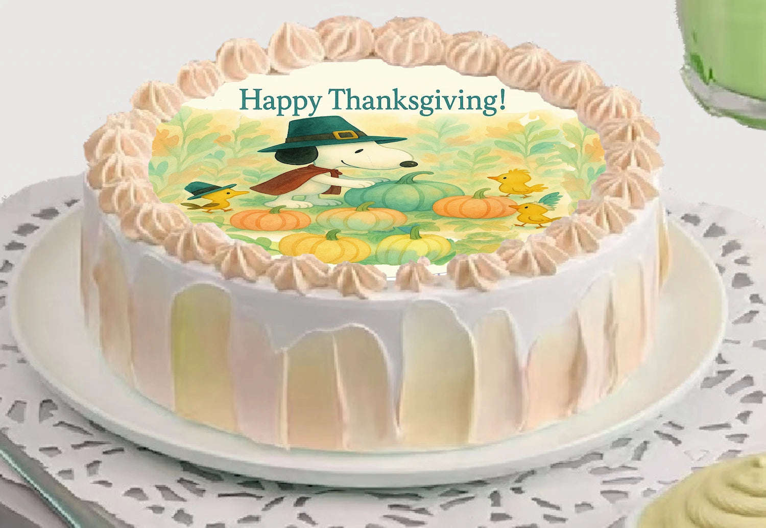 Snoopy and his pal Woodland with pumpkins on a colorful edible image on top of a thanksgiving cake