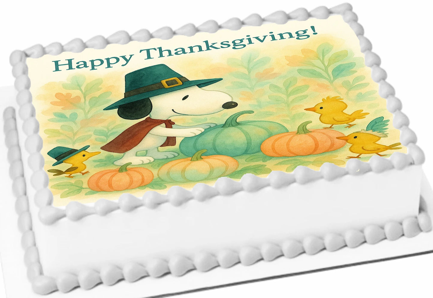 Image of Snoopy and Woodstock in a brightly colored pumpkin patch, fall leaves on a Thanksgiving edible image cake topper.