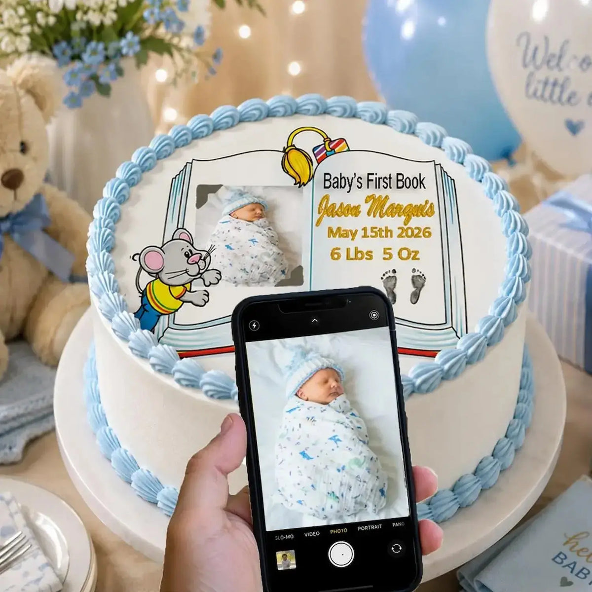 In Use: edible icing cake topper featuring Baby's First Book design with a boy photo and birth details at a baby shower