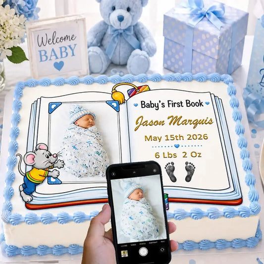 In Use: edible icing cake topper featuring Baby's First Book design with a boy photo and birth details at a baby shower