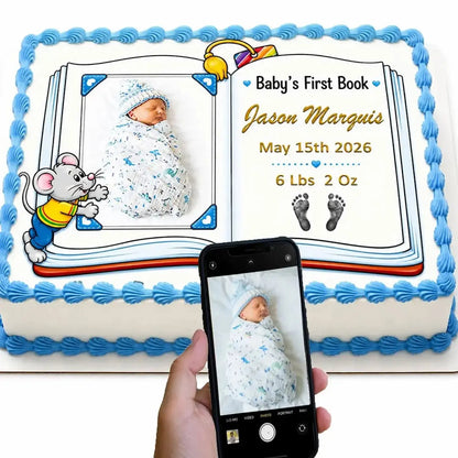 Personalized edible icing cake topper with Baby's First Book design with a boy photo and birth details, shown beside the original photo