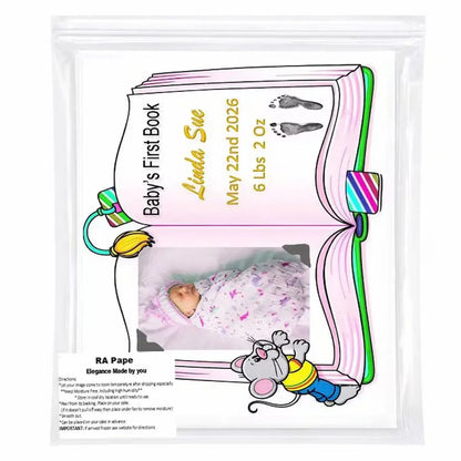 Protective Packaging: 8.5 x 10.5-inch edible icing sheet with Baby's First Book design with a girl photo and birth details stored in a sealed bag