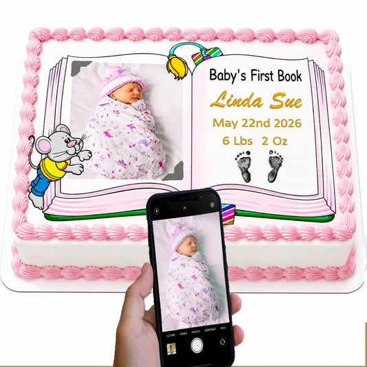Personalized edible icing cake topper with Baby's First Book design with a girl photo and birth details, shown beside the original photo
