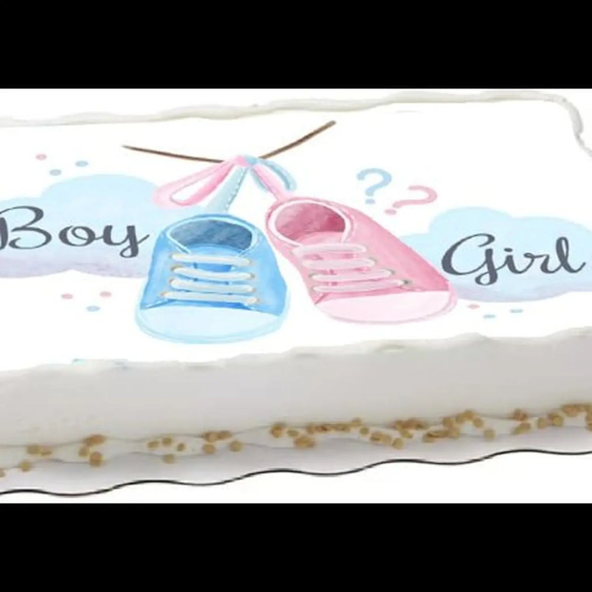 8.5 x 10.5-inch edible icing sheet featuring pink and blue baby shoes displayed on a frosted cake