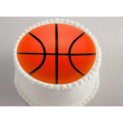 Basketball Edible Icing Cake Topper, on a white frosted cake.