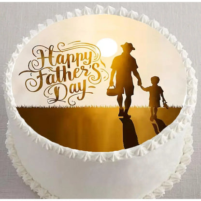 Father's Day edible icing cake topper with a father and child silhouette, shown on a frosted cake.