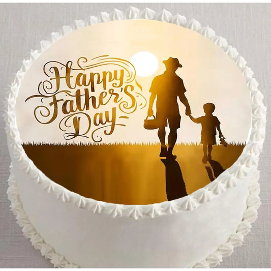 Father's Day edible icing cake topper with a father and child silhouette, shown on a frosted cake.