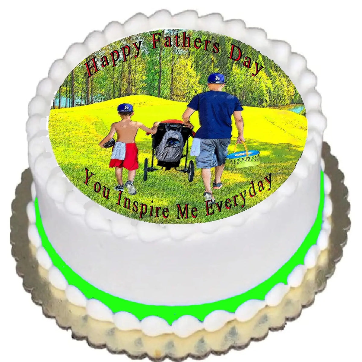 Father's Day edible icing cake topper with a father and children walking in a park, shown on a frosted cake.